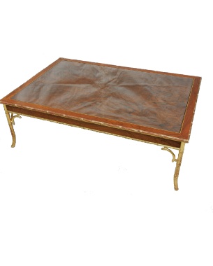 A large simulated rosewood and gilded bamboo coffee table in the Regency taste