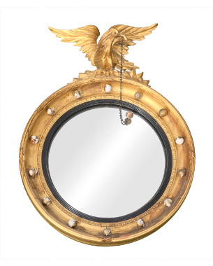 A Regency giltwood convex mirror with an eagle heading
