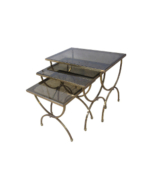A 1950s brass French nest of three table