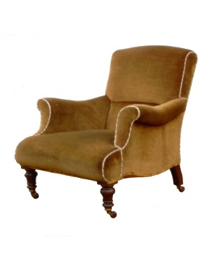 A late Victorian upholstered walnut armchair