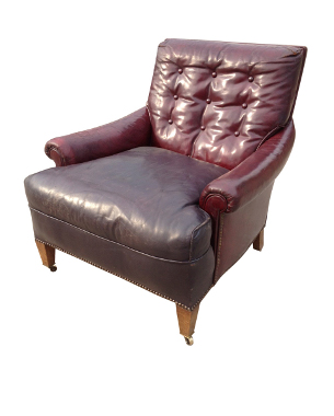 A Howard-style mahogany and leather club armchair