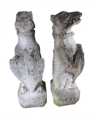 A pair of composite stone 'griffen dogs with shields'