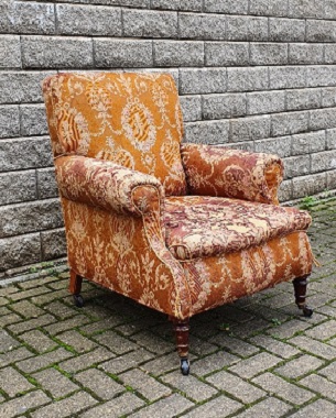 A late Victorian walnut armchair