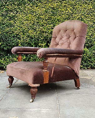 A fine mid Victorian rosewood open upholstered armchair
