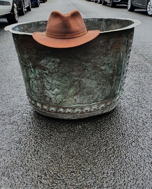 A  large copper cauldron
