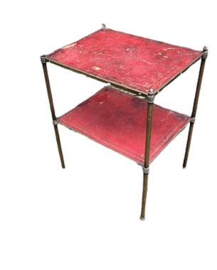 A  brass and leather two-tier table