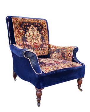 A   fine late Victorian 'carpet' armchair