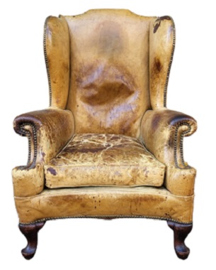 A   Queen Anne style mahogany and leather wing back chair