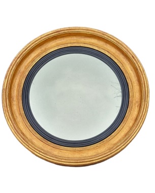 A   gilded convex mirror