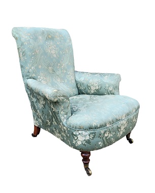 A     early Victorian Howard & Son armchair