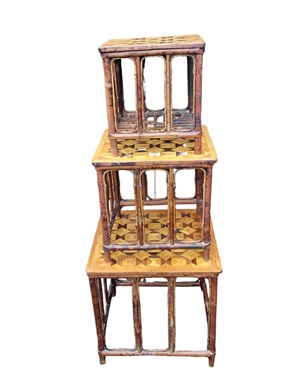 A     nest of three bamboo and parquetry tables