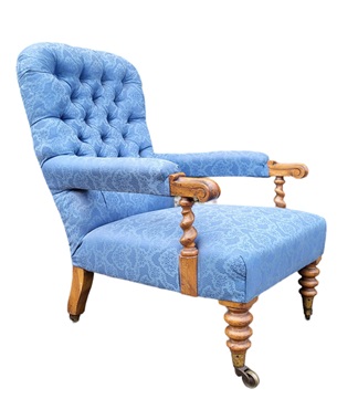A        Victorian walnut open armchair