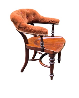 A          late Victorian mahogany office chair