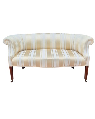 A           Edwardian mahogany 'petite' settee