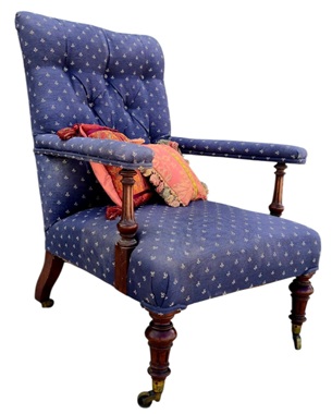 A         early Victorian mahogany open armchair