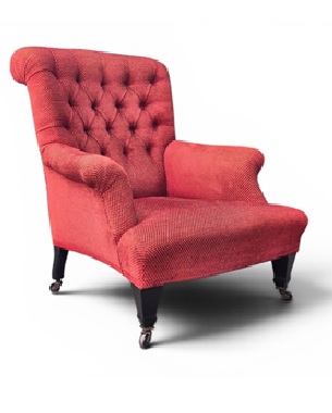 a                early 20th Century upholstered armchair by Maple & Co.